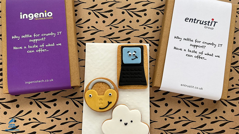 Branded gift boxes of themed biscuits, sent as direct mail